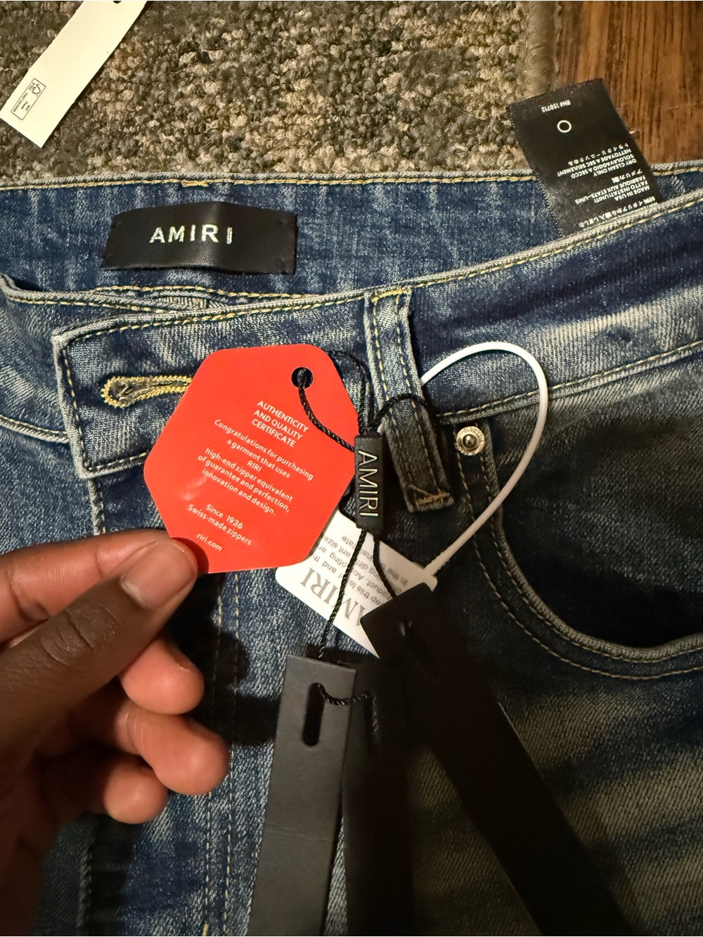 AMIRI Light Blue Distressed Jeans with Red Patch Details - Picture 2 of 4